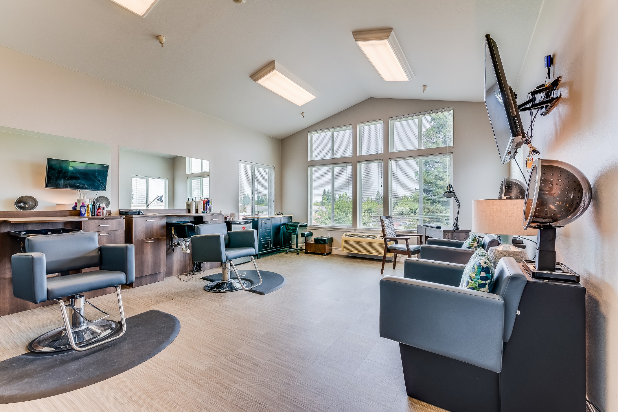 Bright salon area with chairs and natural light