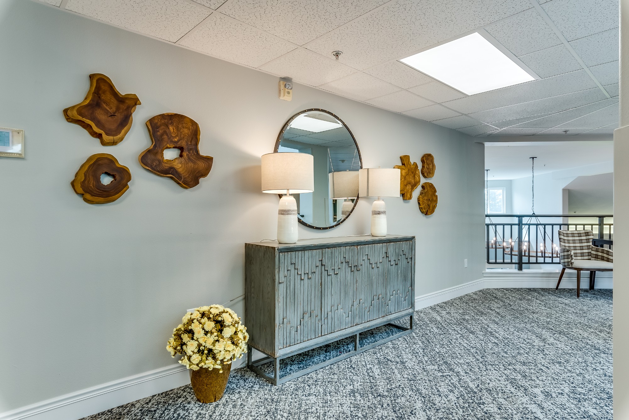Bright, welcoming lobby with decor and furnishings