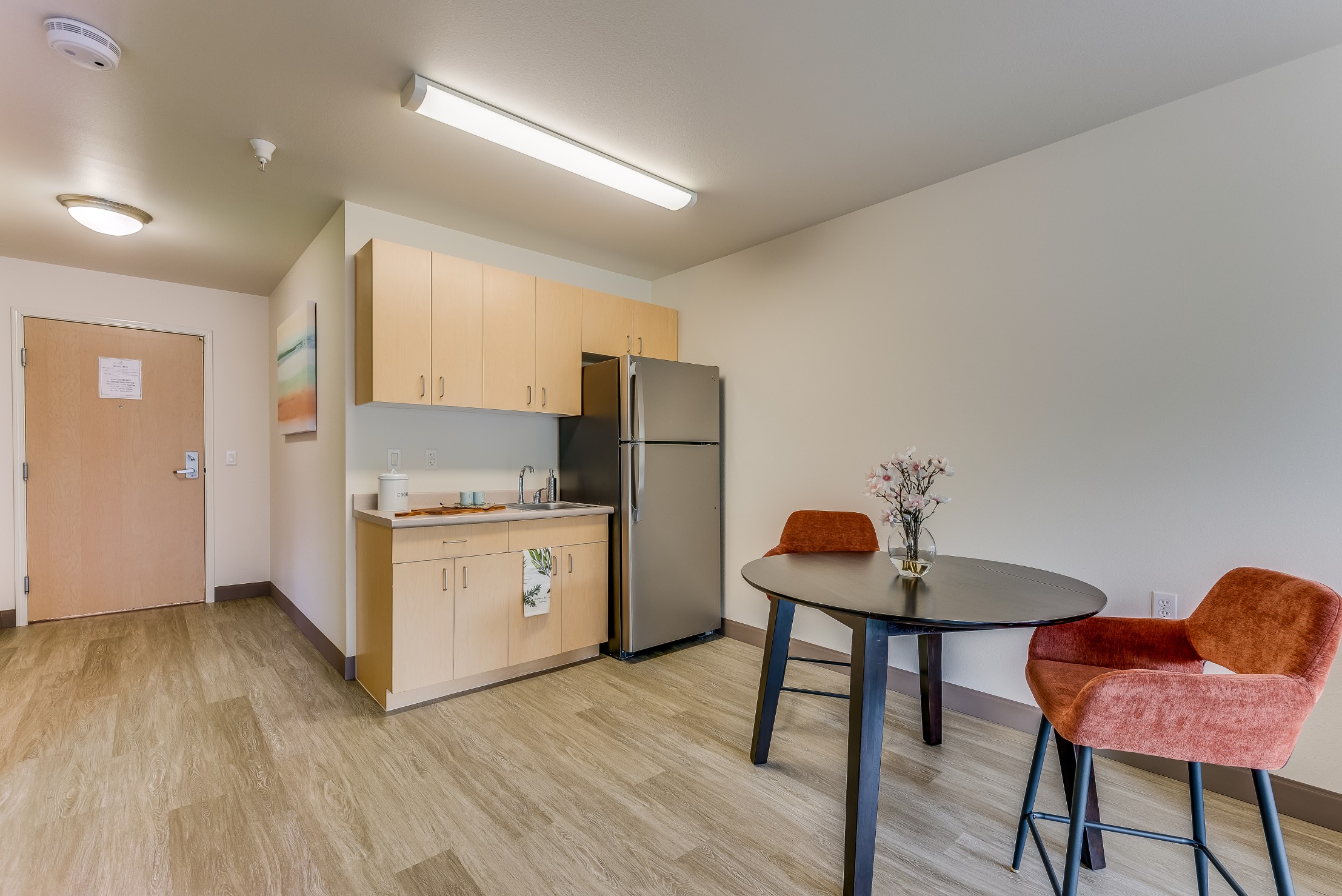 Interior shot of a kitchenette and dining area