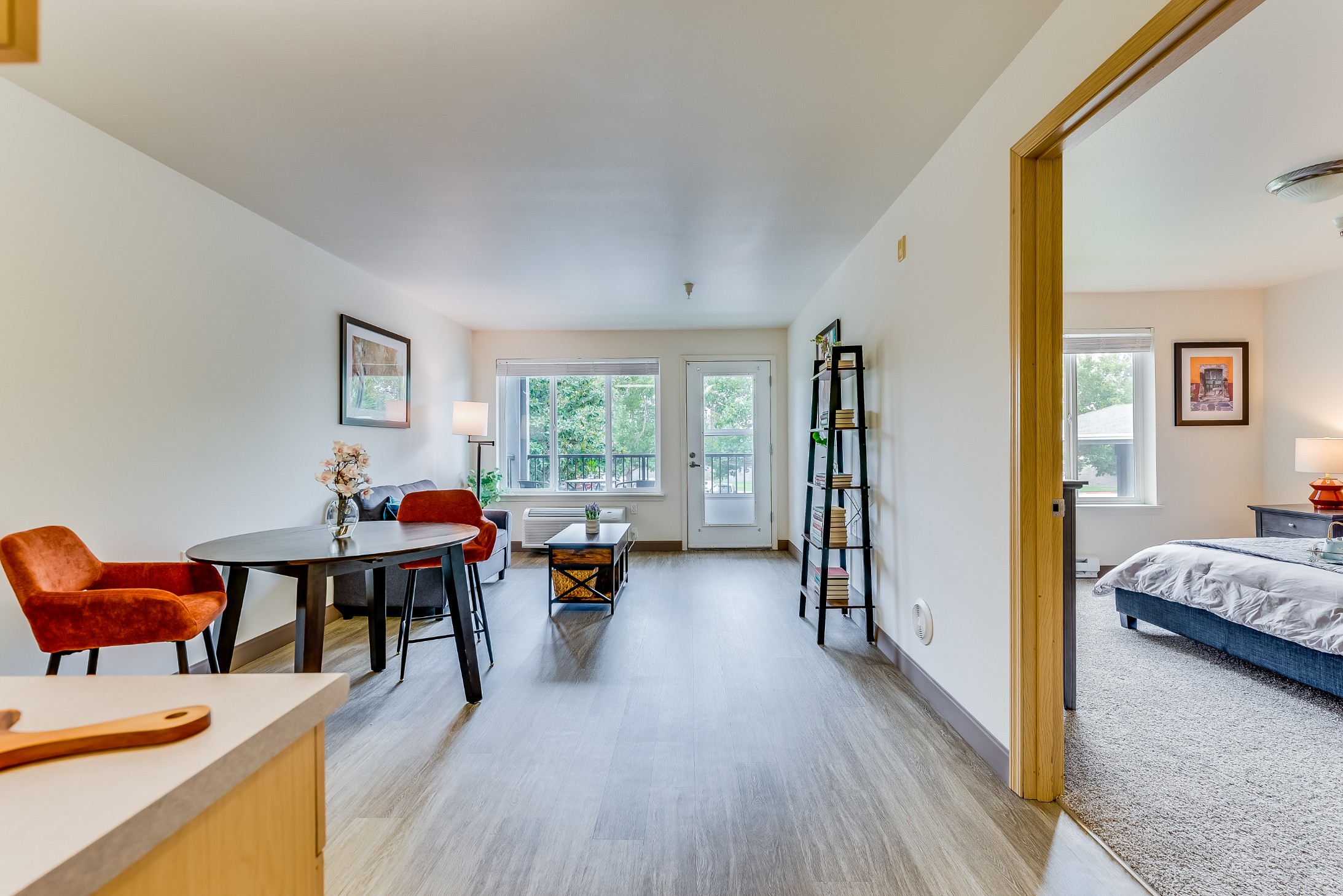Bright interior of a resident room with furniture