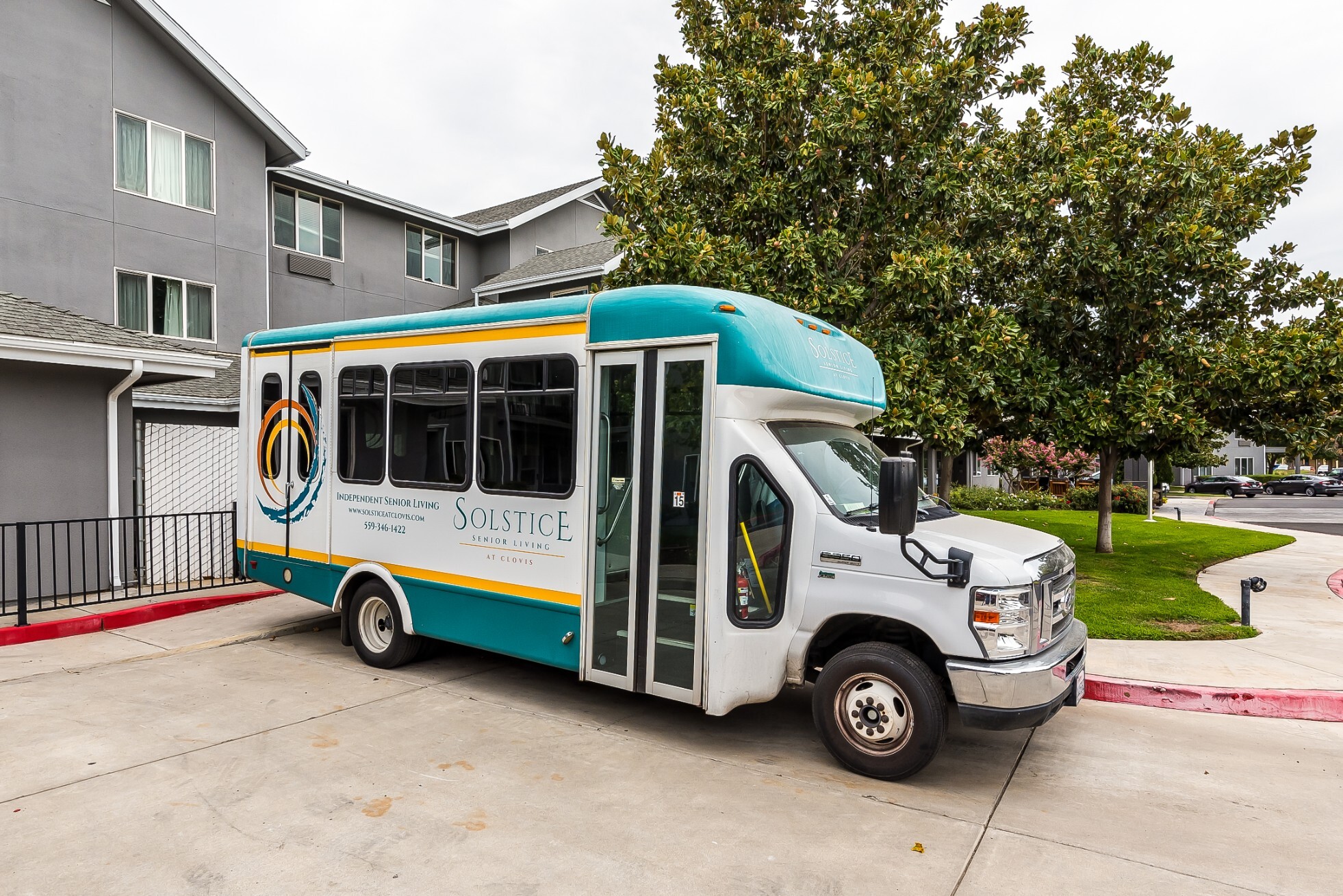Facility shuttle bus parked outside