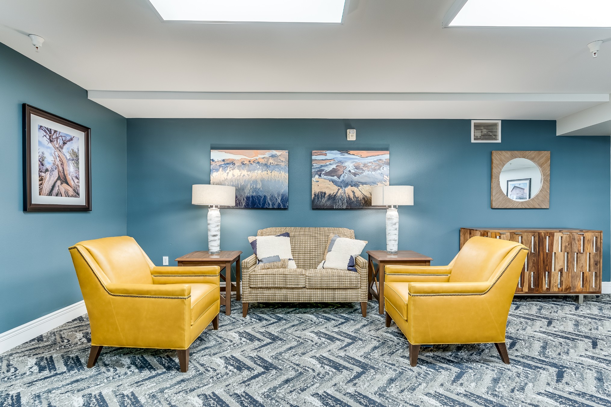 Cozy common area with seating and art