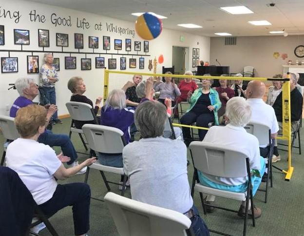 Residents participating in a beach ball activity