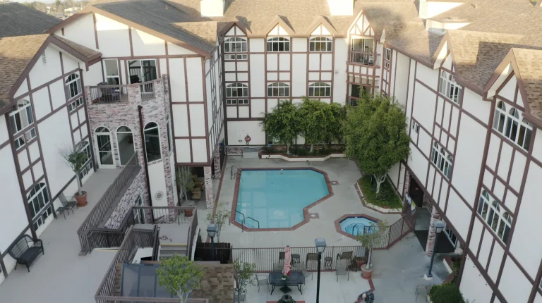 Aerial view of the facility pool and courtyard area