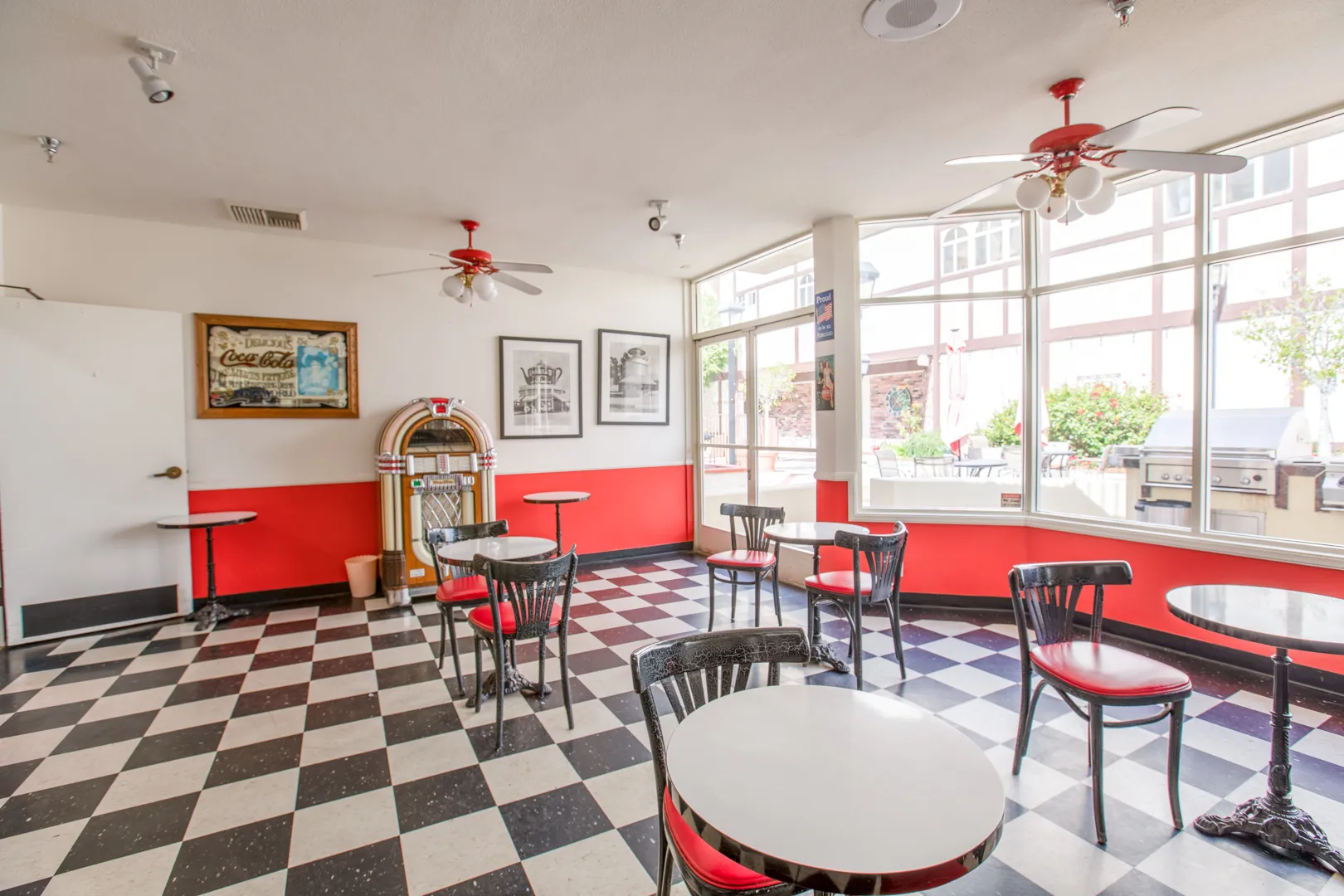 Bright dining area with retro decor and tables
