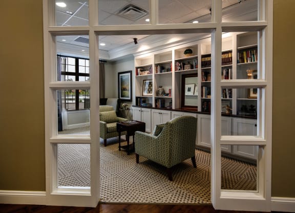 Interior of a cozy common area with bookshelves