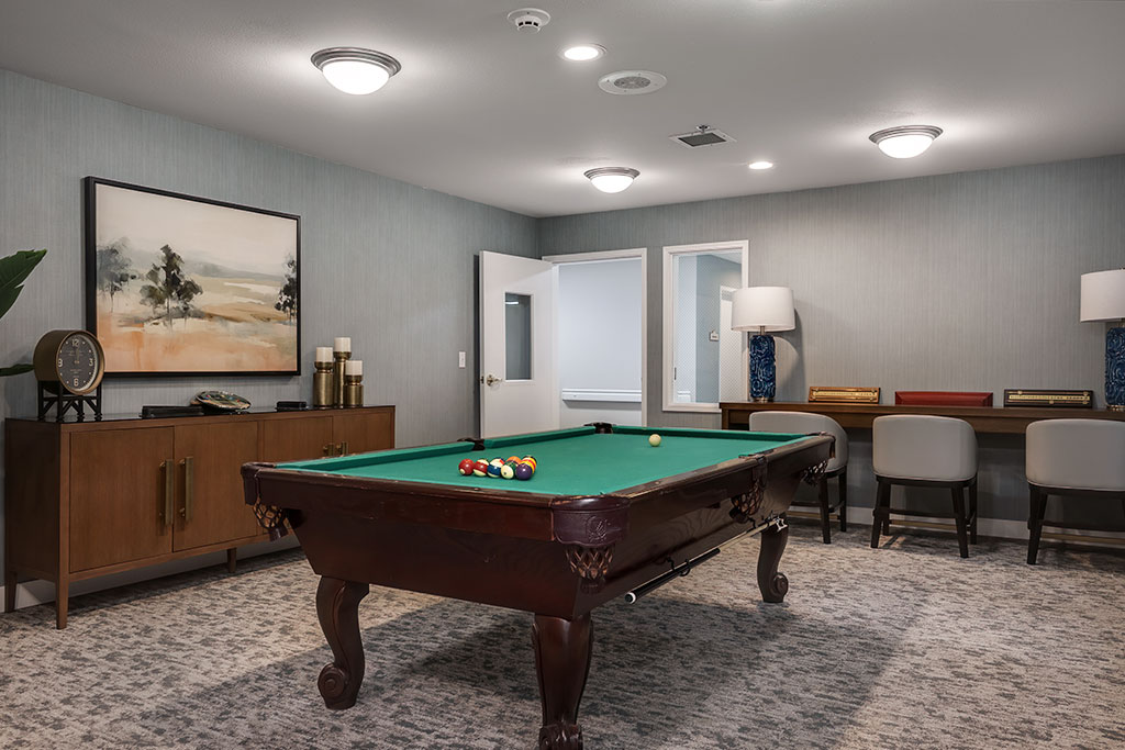 Interior view of a common area with a pool table