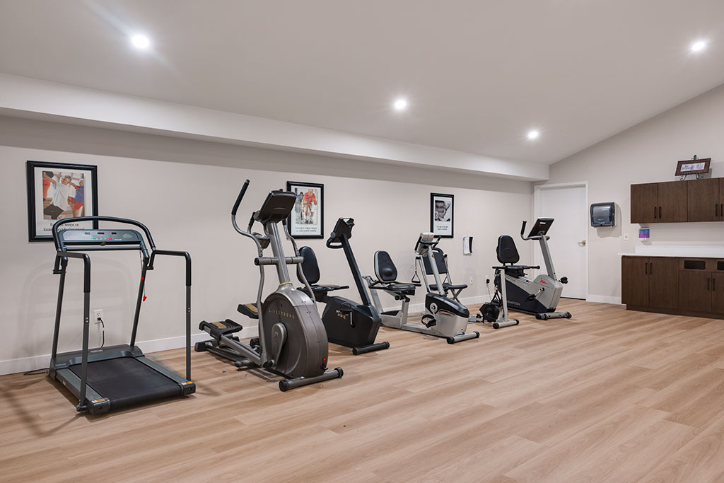 Interior view of a fitness area with exercise equipment