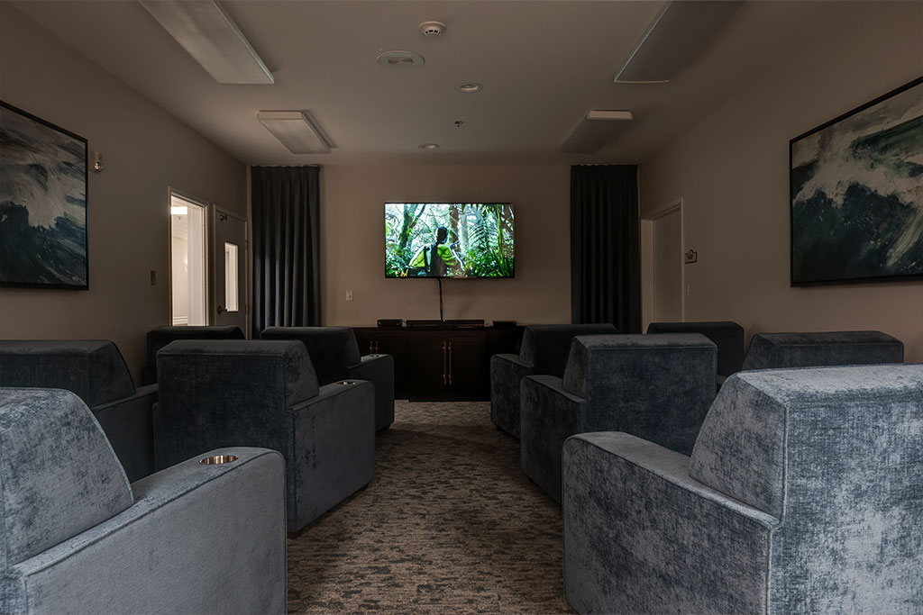 Common area with comfortable seating and a TV