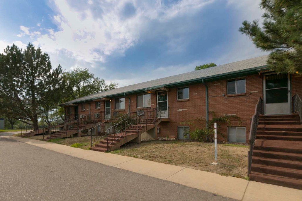 Exterior view of the facility building with walkways