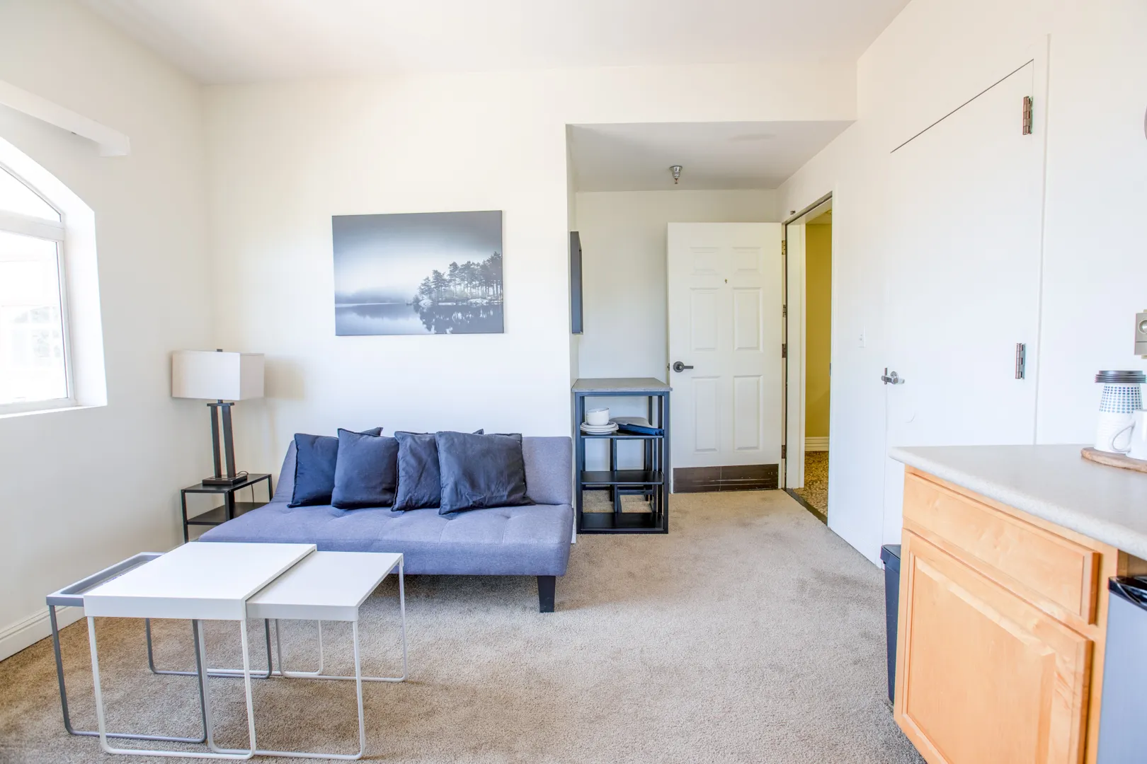 A cozy interior of a resident room with furniture