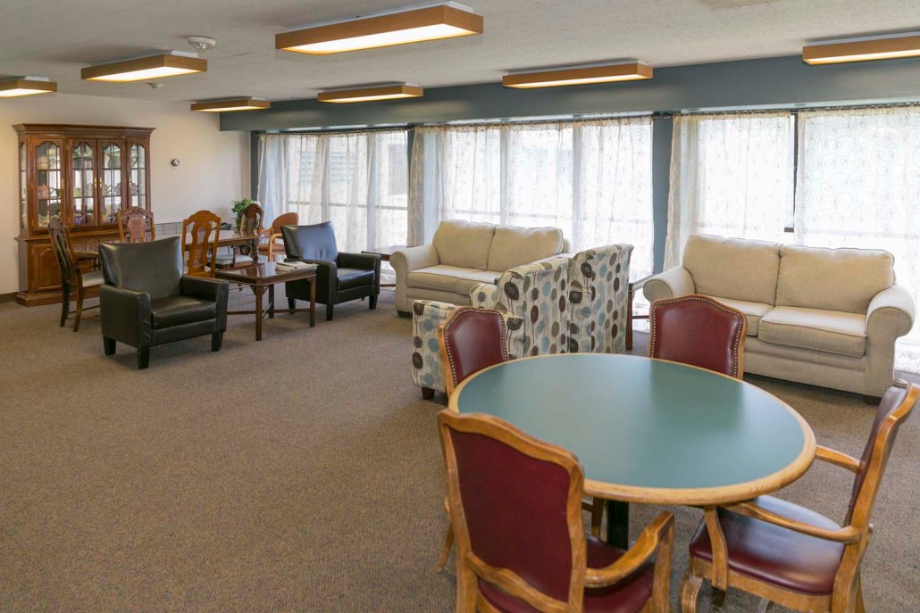 Interior common area with seating and natural light