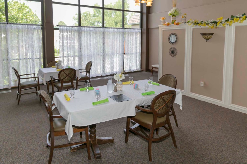 Dining area with tables set for a meal