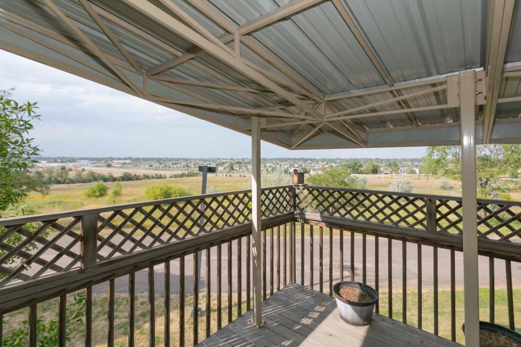 View from a balcony overlooking a countryside landscape