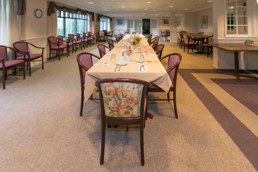 Dining room with tables set for a meal