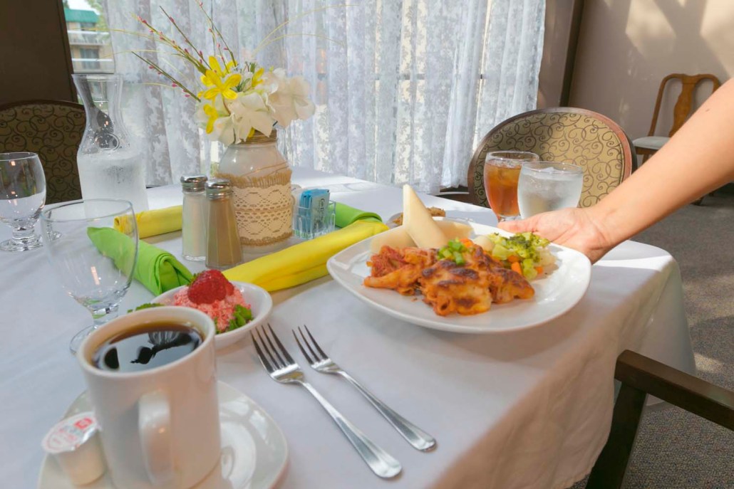 A beautifully set dining table with food served