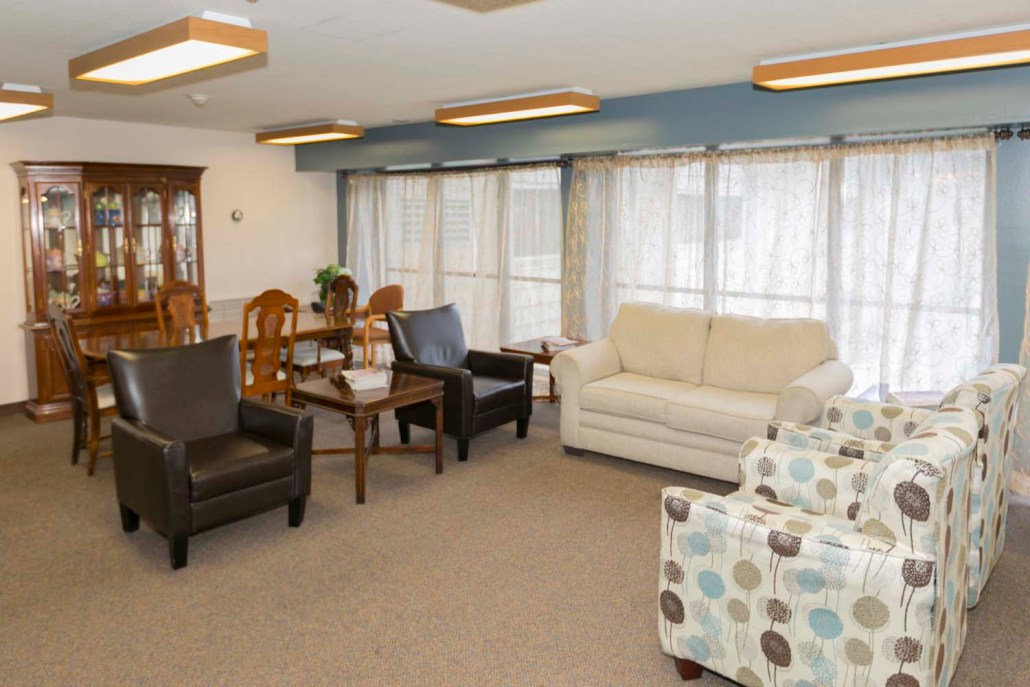 Common area with seating and natural light