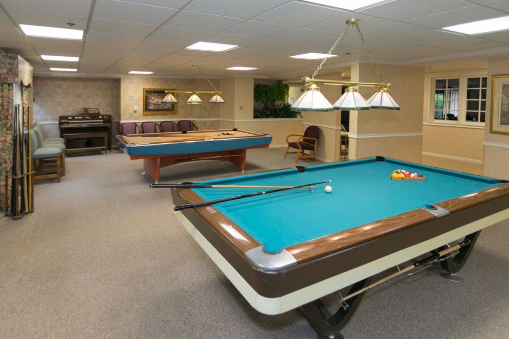 Interior recreational area with billiard tables