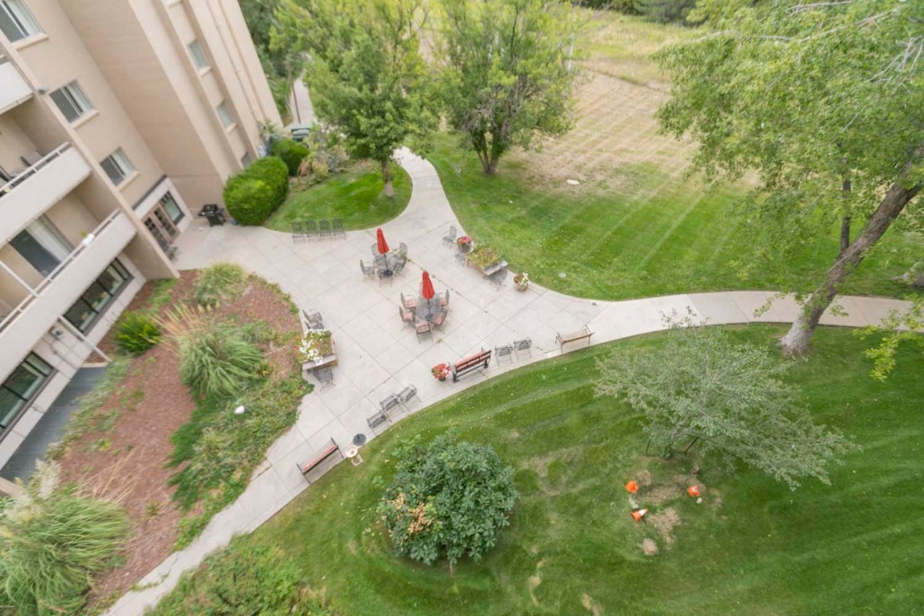 Aerial view of outdoor seating area with gardens