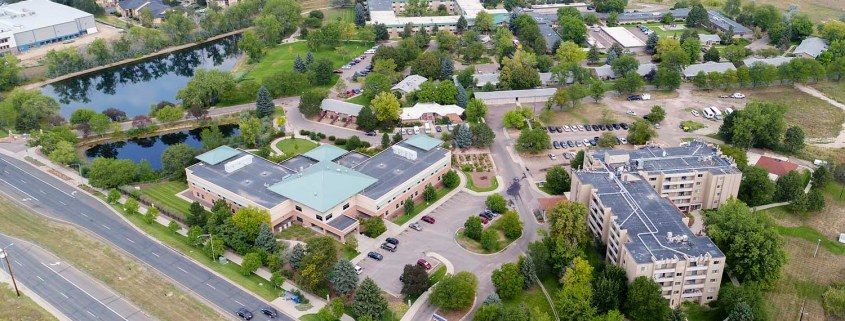 Aerial view of The Villas at Sunny Acres and surrounding greenery
