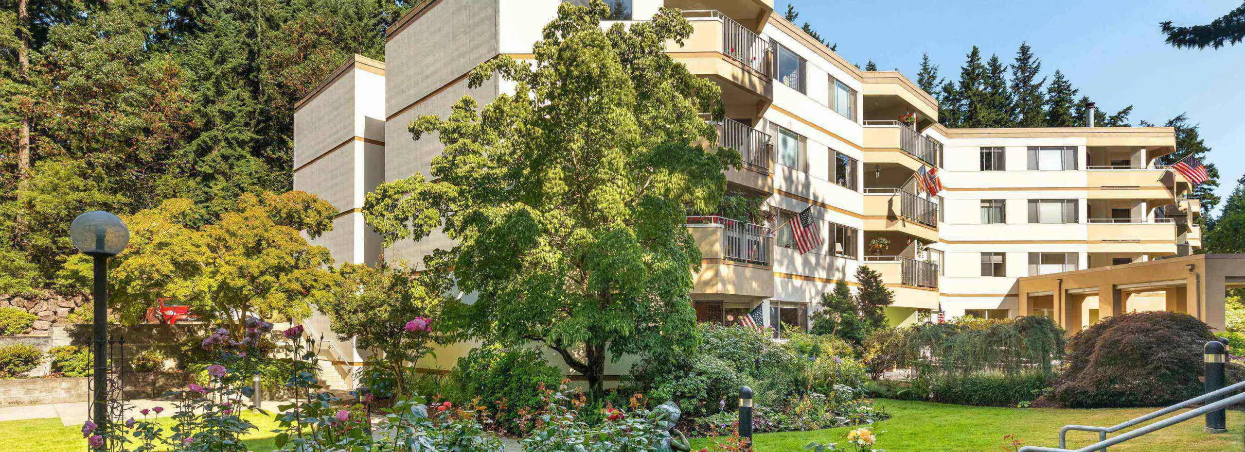 Exterior view of Cristwood facility with garden
