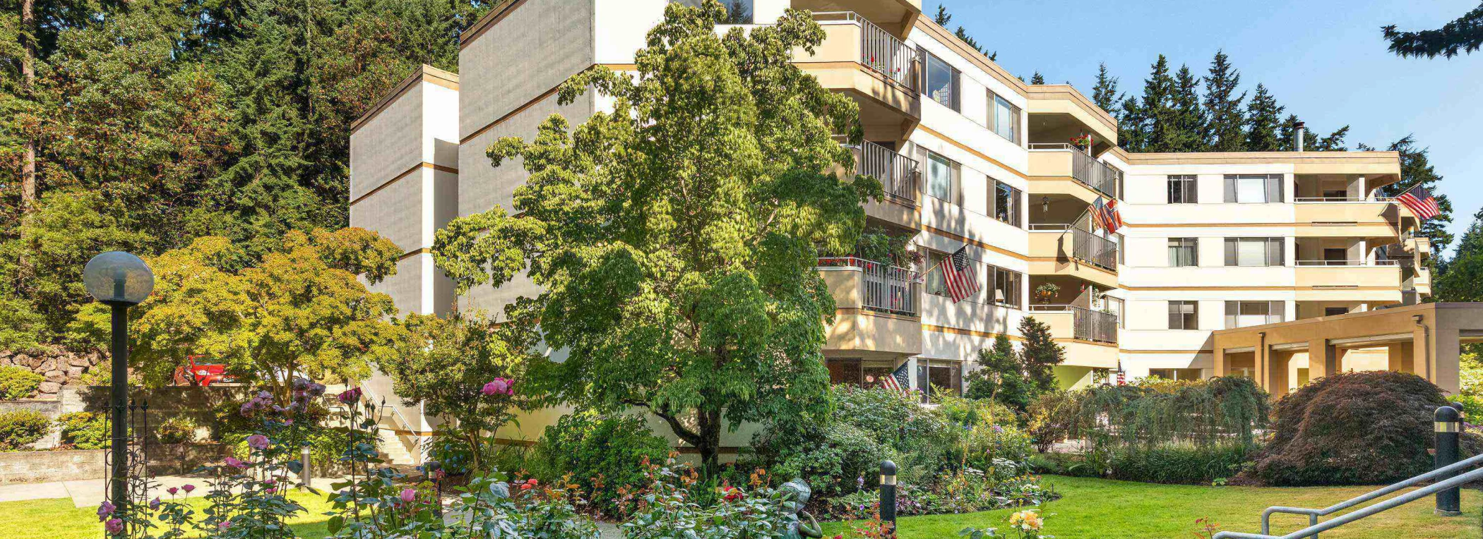 Exterior view of Cristwood facility with garden