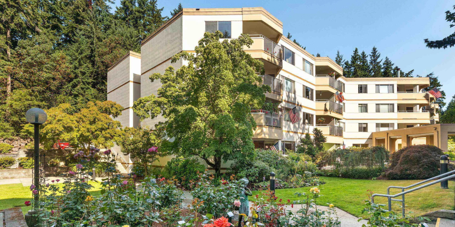 Exterior view of Cristwood facility surrounded by gardens