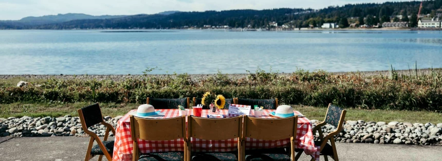 Outdoor dining setup by the water