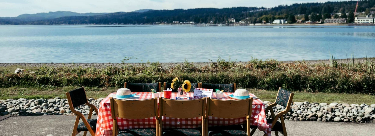 Outdoor dining setup by the water