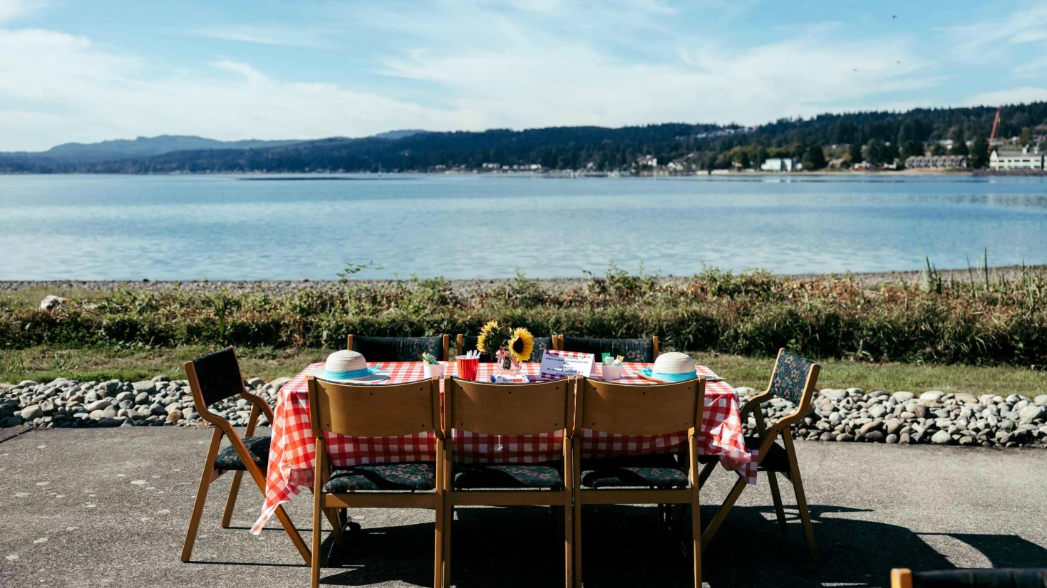 Outdoor dining setup by the water