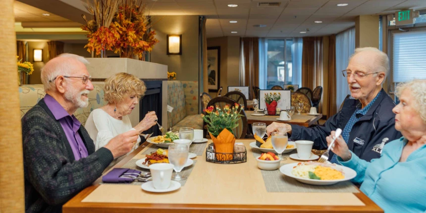 Residents enjoying a meal in the dining room