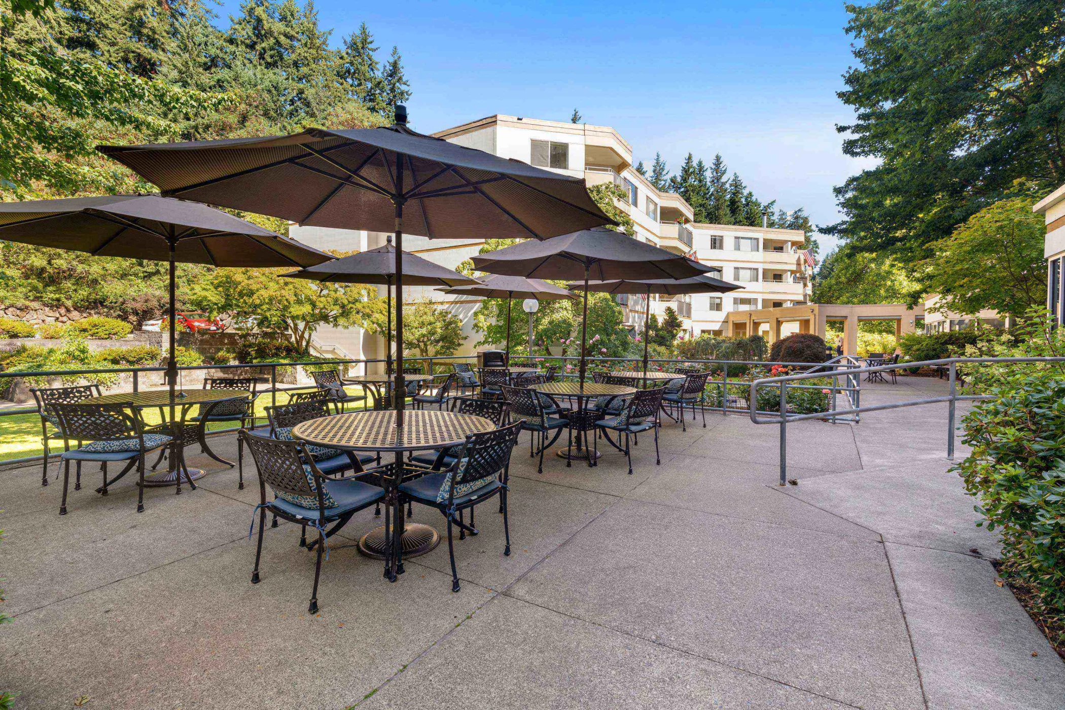 Outdoor seating area with umbrellas and tables