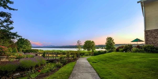 Beautiful landscaped path leading to a lake