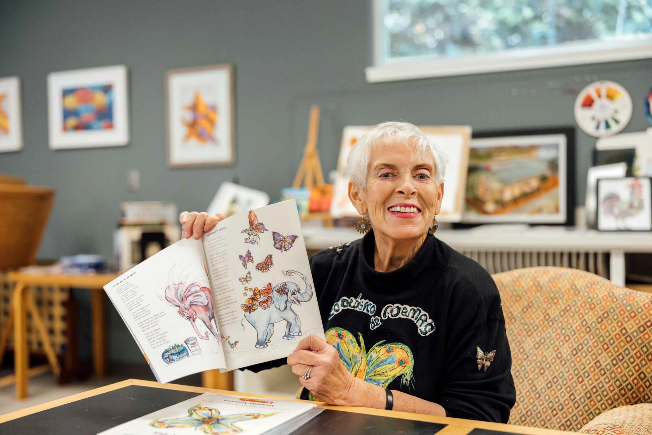 Resident engaging in art activity in a bright room
