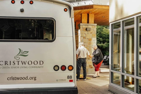 Residents interacting at the entrance of Cristwood community