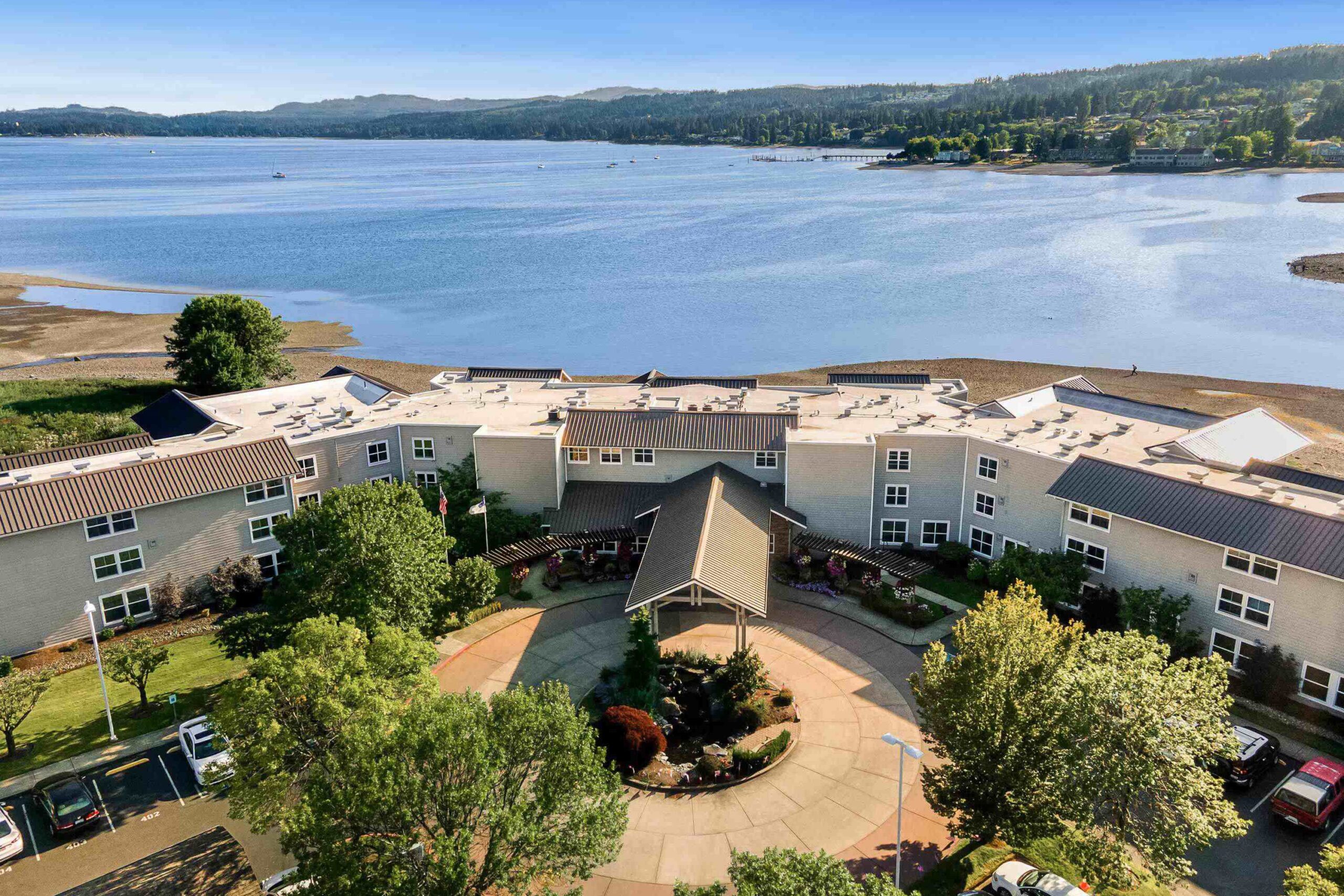 Aerial view of the facility with landscaped outdoor space