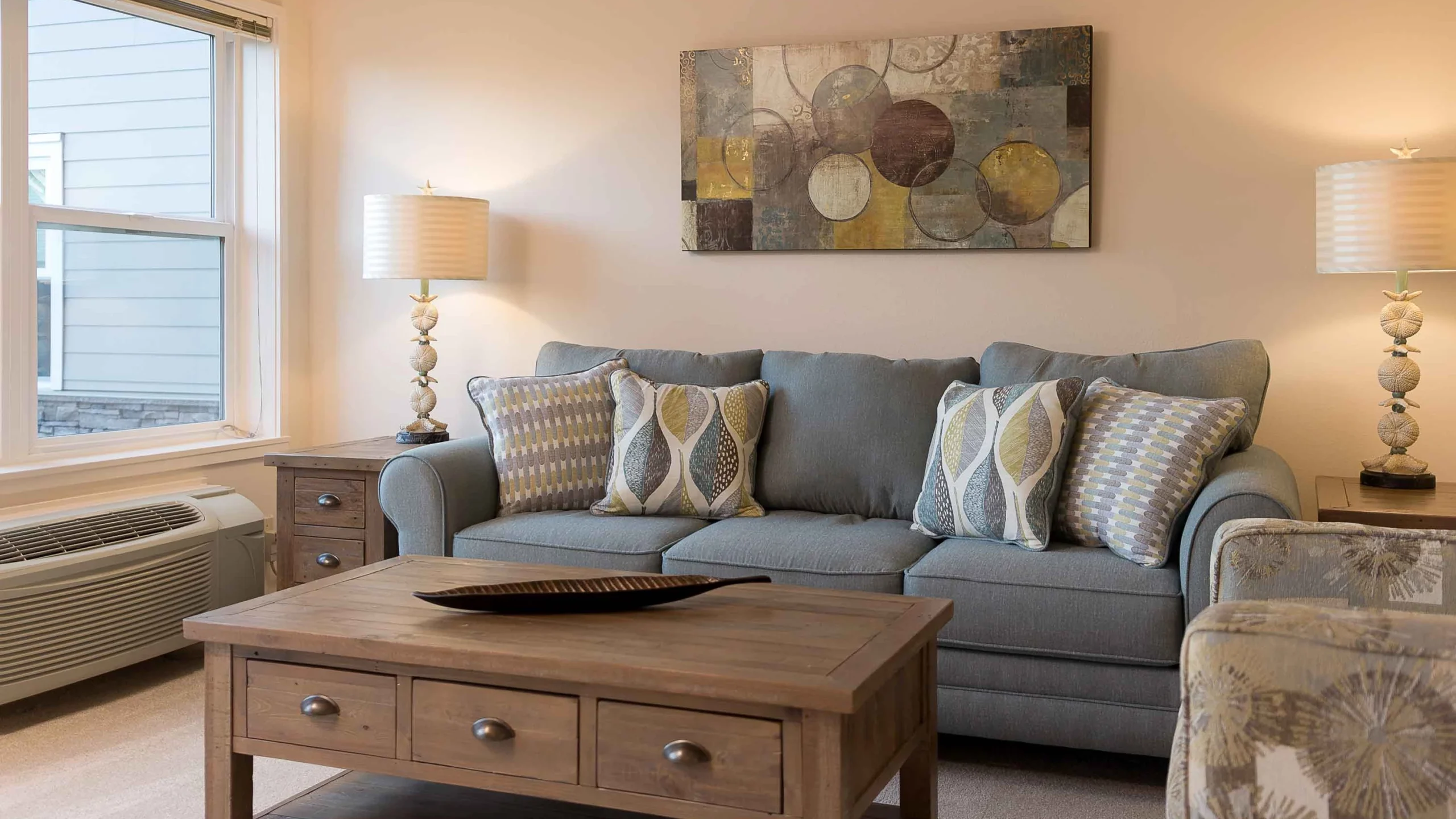Cozy living room with a sofa and decorative artwork