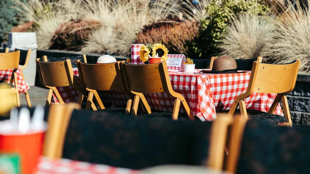 Outdoor dining area with checkered tablecloths