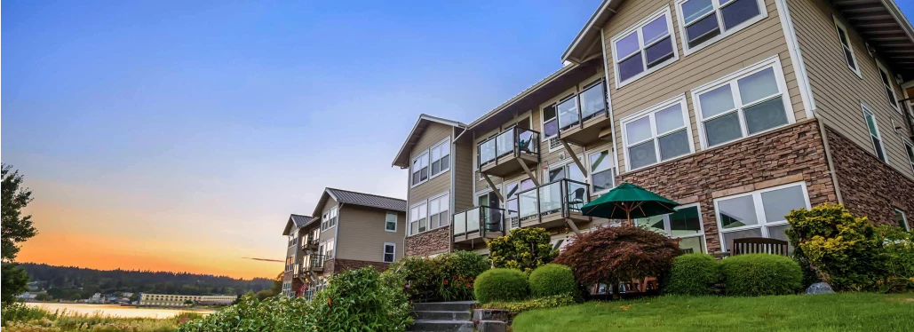 Exterior view of Cristwood assisted living facility at sunset