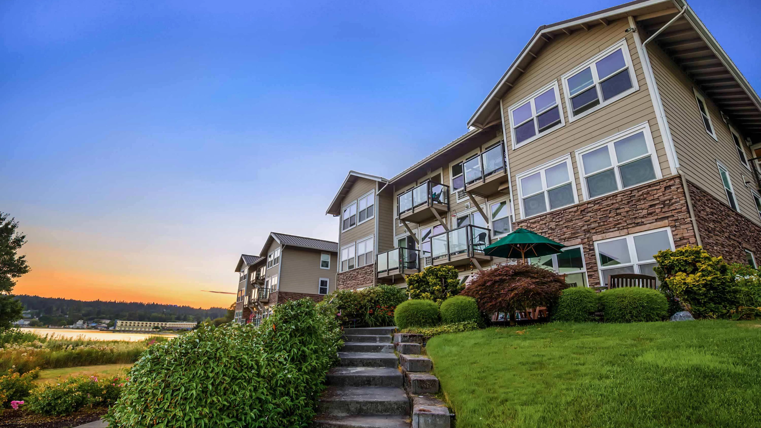 Exterior view of the assisted living facility at sunset