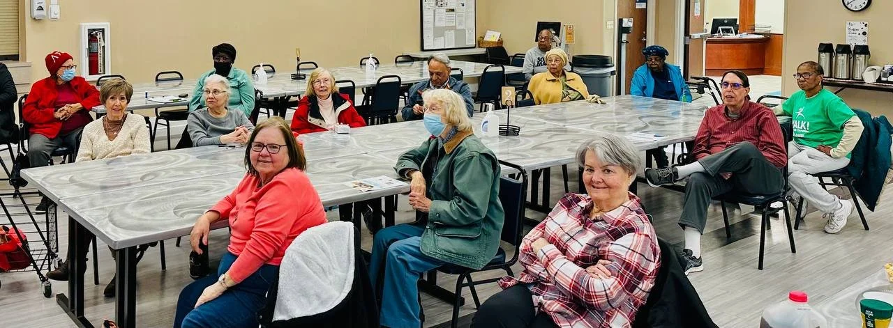 Residents enjoying a gathering in a common area.