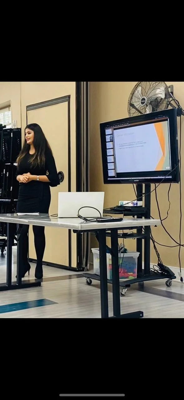 Speaker presenting in a meeting room