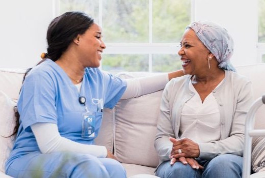 Staff member and resident enjoying a moment together.
