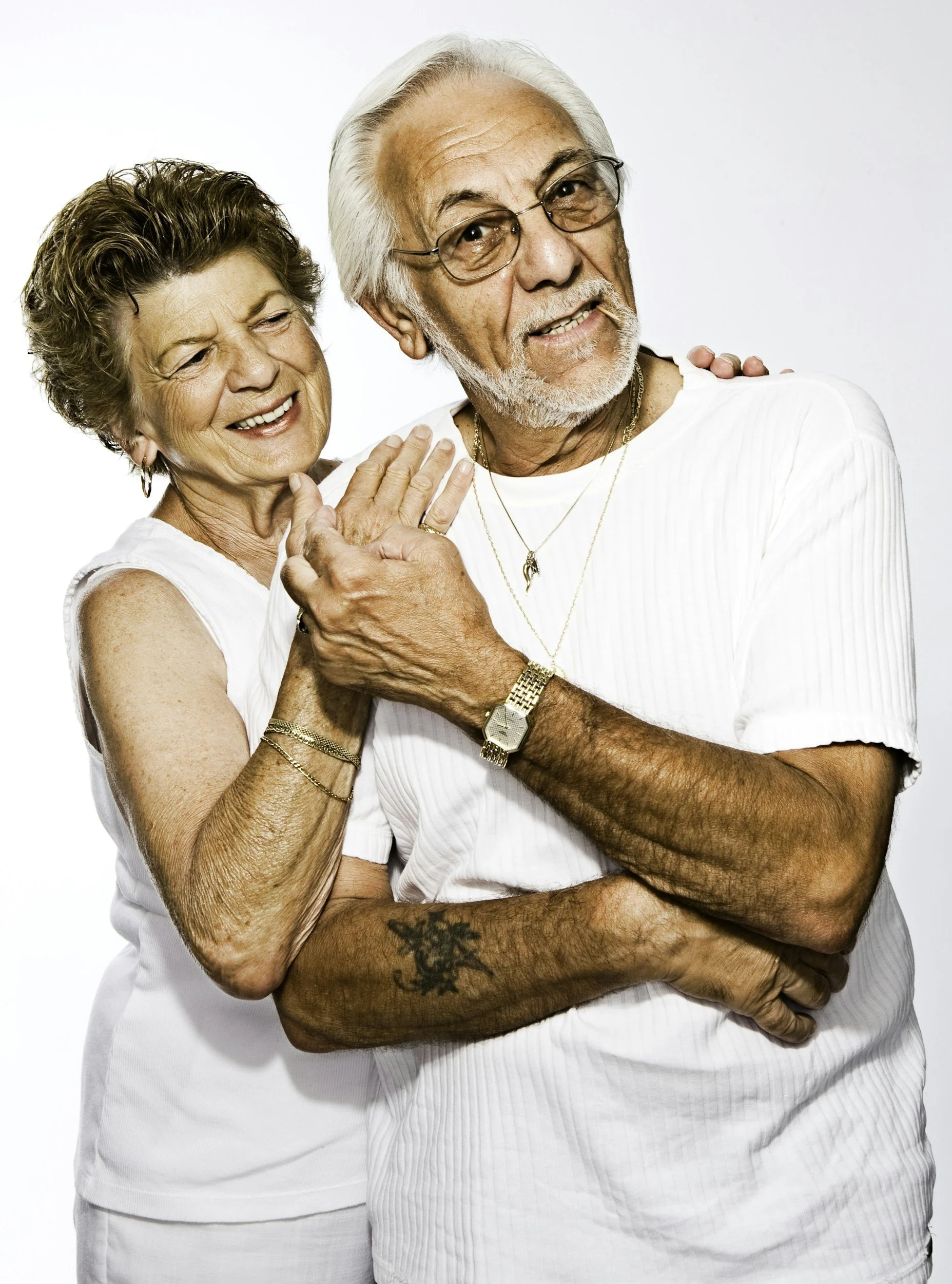 Senior couple smiling together in casual clothing