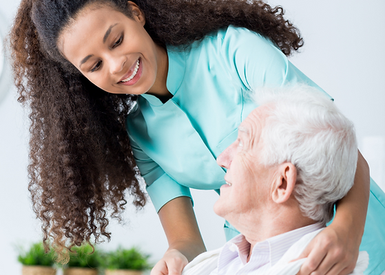 Healthcare worker interacting with an elderly resident
