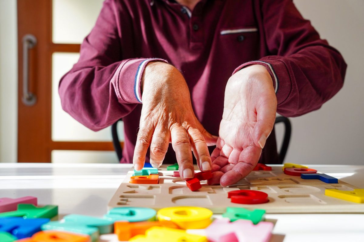 Senior engaging in a puzzle activity
