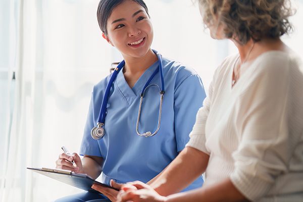 Nurse interacting with a resident