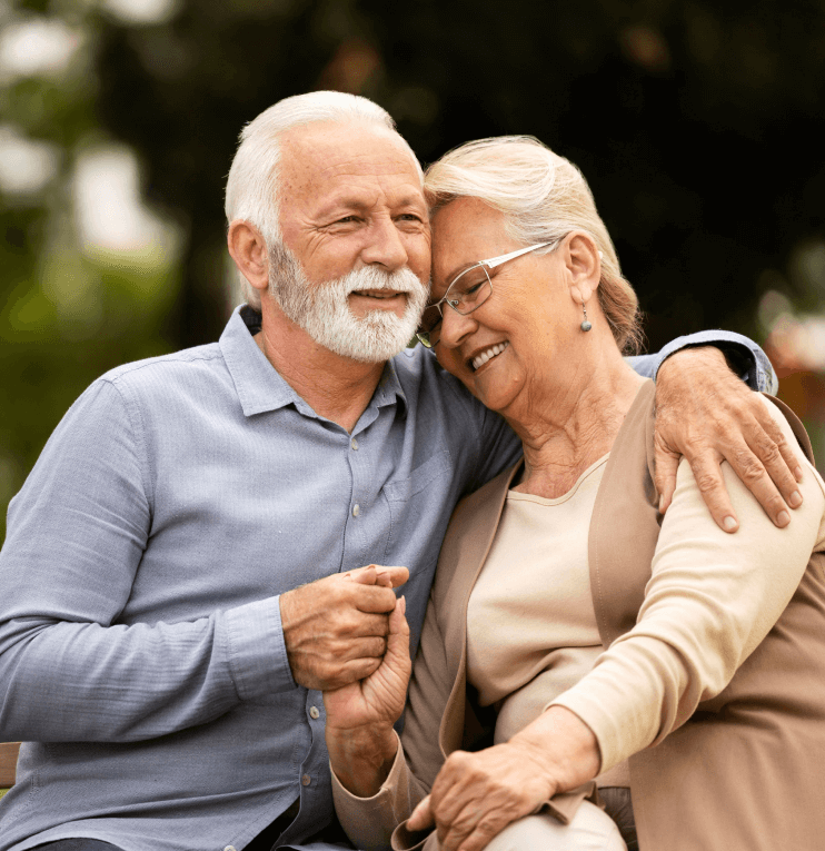 Senior couple enjoying each other's company outdoors.