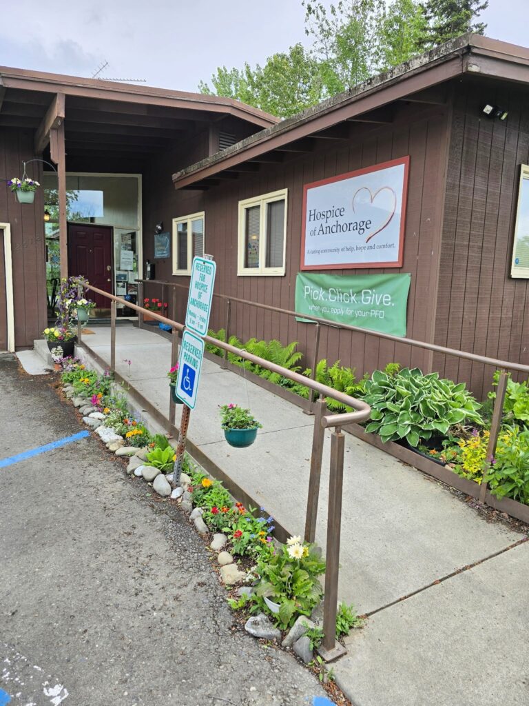 Exterior view of Hospice of Anchorage building entrance.