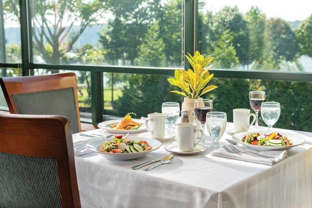 Well-set dining table with meals and drinks